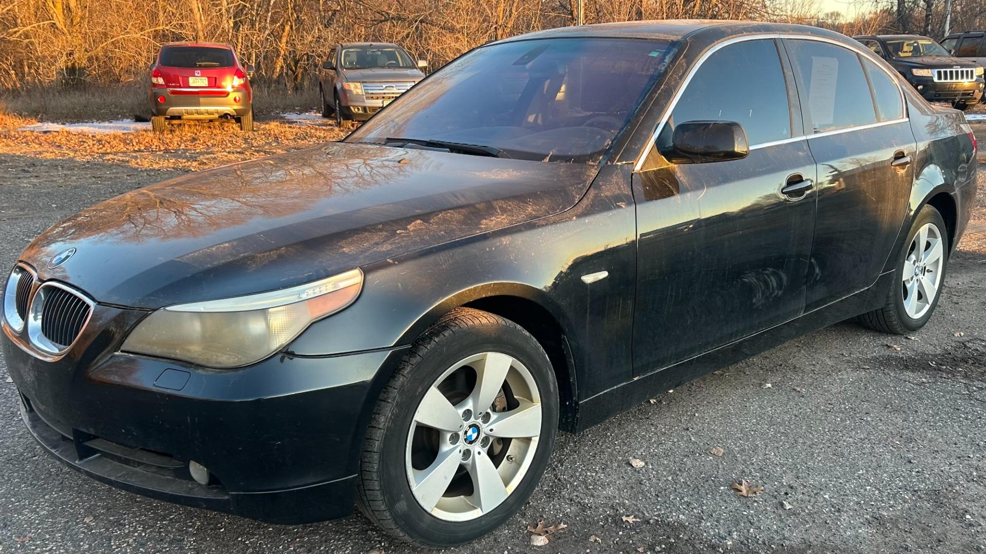 2007 Black BMW 5-Series 525xi (WBANF33547C) with an 3.0L L6 DOHC 24V engine, located at 17255 hwy 65 NE, Ham Lake, MN, 55304, 0.000000, 0.000000 - Photo#0